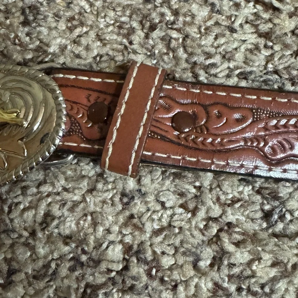 Nocona brown tooled leather belt with bullrider belt buckle Size 18